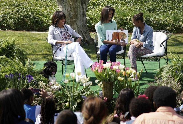 Michelle Obama feels she serves as a single mother to daughters Sasha and Malia.