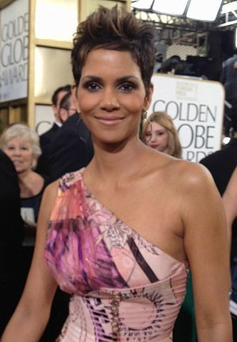 Halle Berry is expecting her first child with Oliver Martinez.