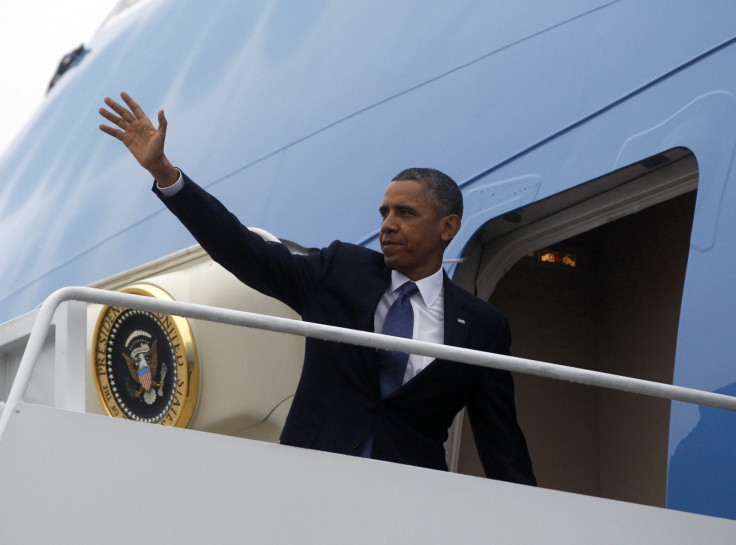 U.S. President Barack Obama steps aboard Air Force one at Andrews Air Force Base near Washington.