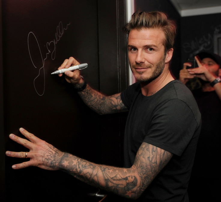 David Beckham leaves his signature at the bar of the hotel Fontainebleu in Miami. (Grosby Group)