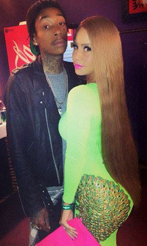 Amber Rose shows off new do and becomes almost unrecognizable.