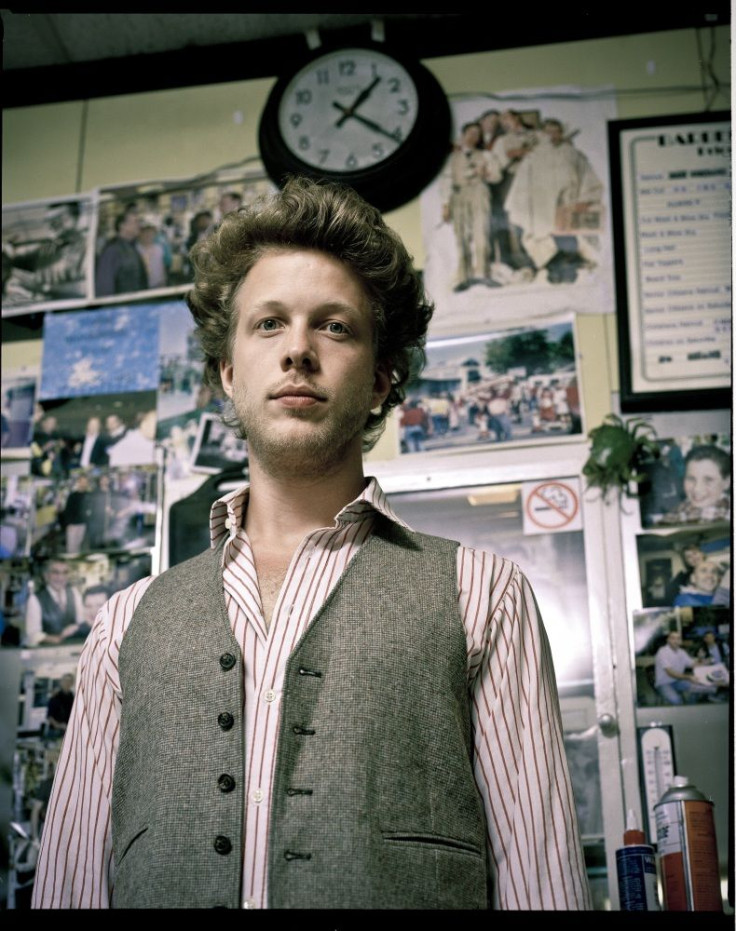 A blood clot on the brain of Mumford & Sons bassist Ted Dwane has forced the band to postpone three shows.