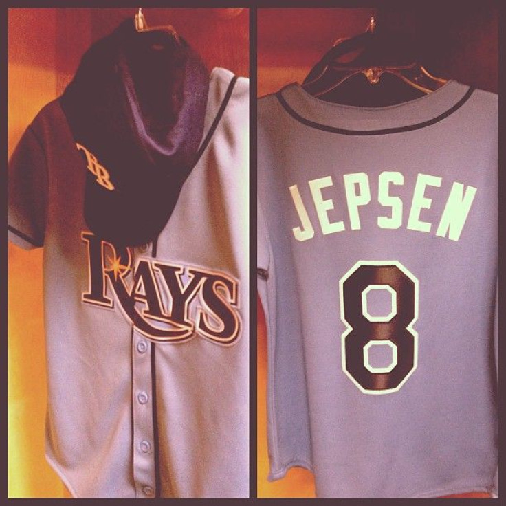 Jepsen showed off her personal Rays jersey to her fans on Instagram, excitedly captioning the photo, "This girls throwing out the first pitch!"