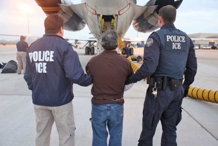 Immigration and Customs Enforcement with a man to be repatriated.