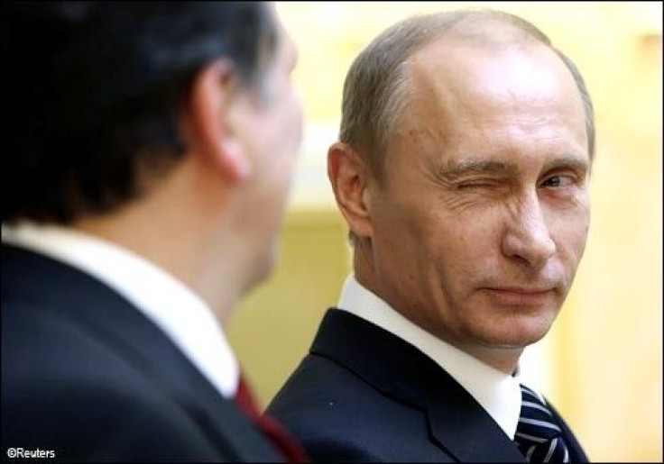 Russian Prime Minister Putin winks at EU Commission President Manuel Barroso in Moscow.