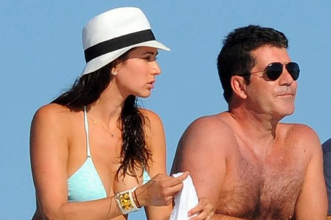 Lauren Silverman and Simon Cowell vacationing last August in St. Bart's with her husband, Andrew, in tow.
