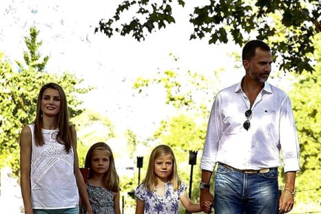 The Prince and Princess of Asturias with their daughters pose for the press at the traditional Majorcan farm of Esporlas.