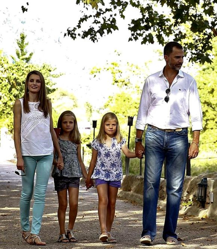 The Prince and Princess of Asturias with their daughters pose for the press at the traditional Majorcan farm of Esporlas.