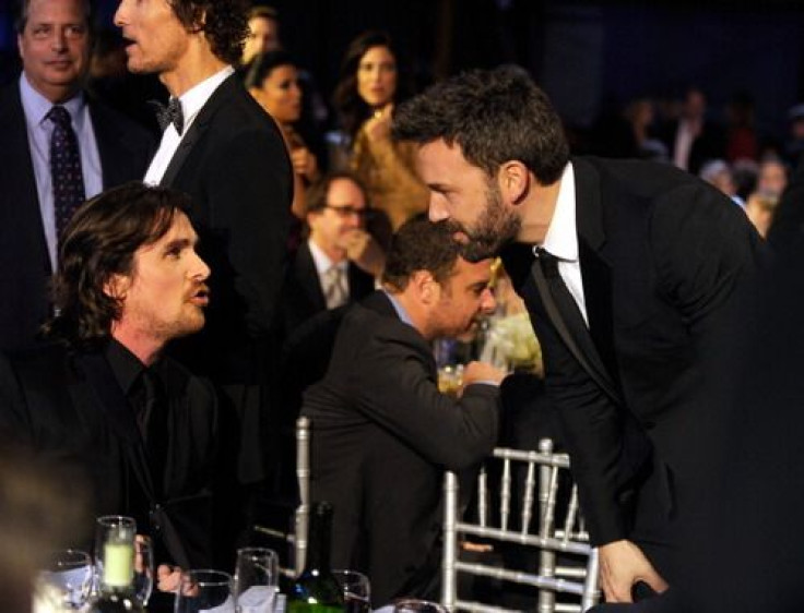 Ben Affleck and Christian Bale together at the Oscars in 2013. Perhaps Bale is passing on some words of wisdom for his Batman successor. 