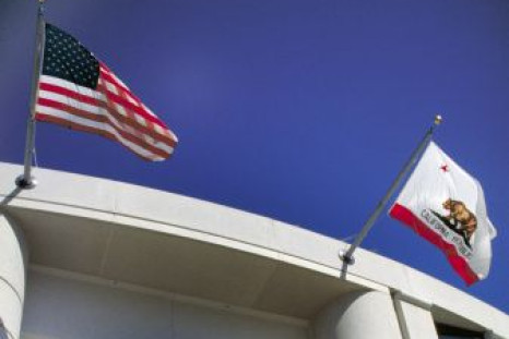 California state seal and flag.