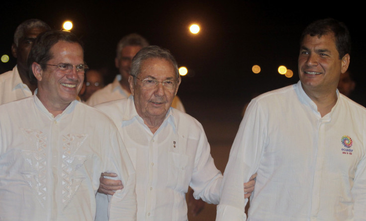 Cuba President Raul Castro (center) sends off Ecuador's President Rafael Correa (right) and Ecuador's Foreign Minister Ricardo Patino (left) on Saturday.