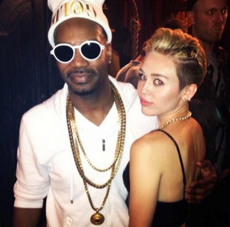 Miley Cyrus, 20, poses with her alleged baby-daddy, rapper Juicy J. At 38-years-old, the "Bandz Make Her Dance" rapper is 18 years older than Cyrus. 