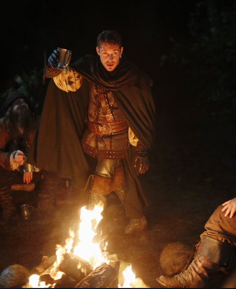 "Once Upon A Time In Wonderland" reintroduces many familiar faces, including Robin Hood who toasts to his Merry Men after a successful haul.