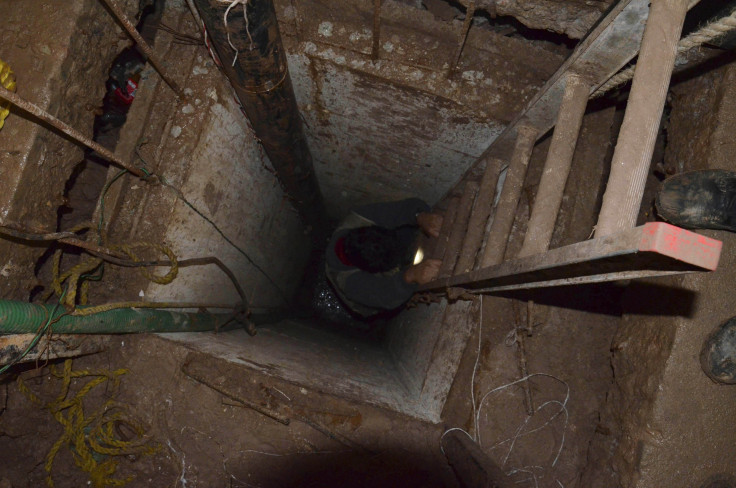 A man climbs down into a smugglers' tunnel discovered in downtown Mexicali city in January.