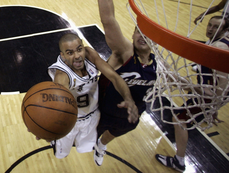 San Antonio Spurs' Tony Parker makes a shot while being defended by Cleveland Cavaliers' Sasha Pavlovic in the 2007 NBA FInals.
