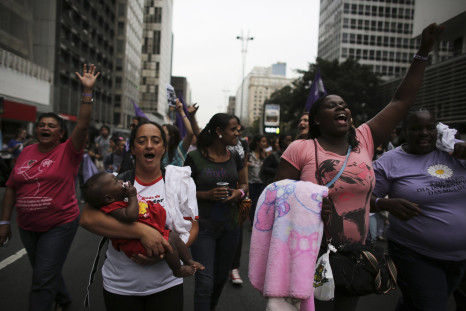 Brazilian women shout slogans during the World March of Women in Sao Paulo August 31, 2013.
