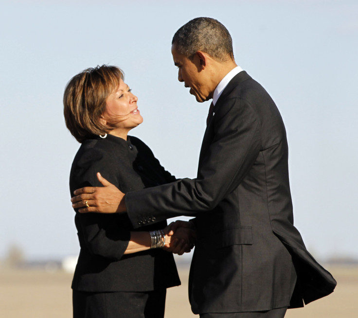 President Barack Obama is greeted by New Mexico Governor Susana Martinez upon his arrival in Roswell, New Mexico, March 21, 2012.
