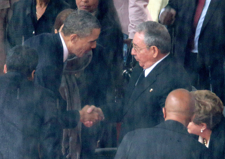 Barack Obama Greets Raúl Castro