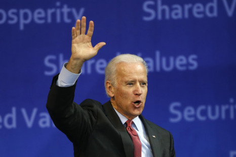 Vice President Joe Biden waves to the crowd as he leaves after delivering his speech at Yonsei University in Seoul December 6, 2013.