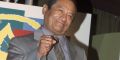Mexico's Armando Manzanero poses with the Latin Grammy Award he received during a news conference announcing the winners of the second annual Latin Grammy Awards October 30, 2001 in Los Angeles.