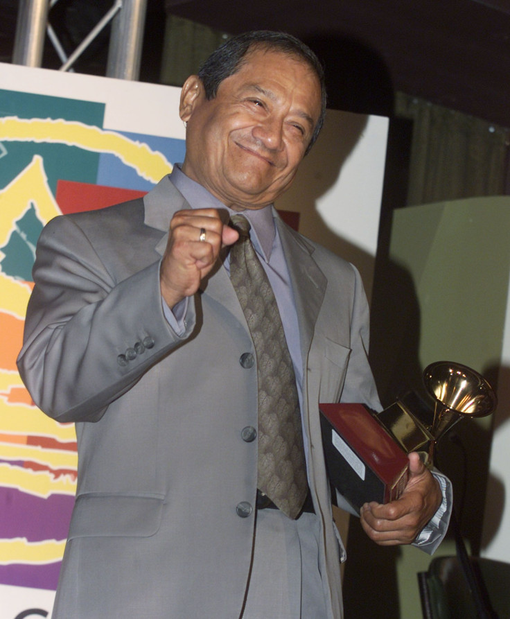 Mexico's Armando Manzanero poses with the Latin Grammy Award he received during a news conference announcing the winners of the second annual Latin Grammy Awards October 30, 2001 in Los Angeles.