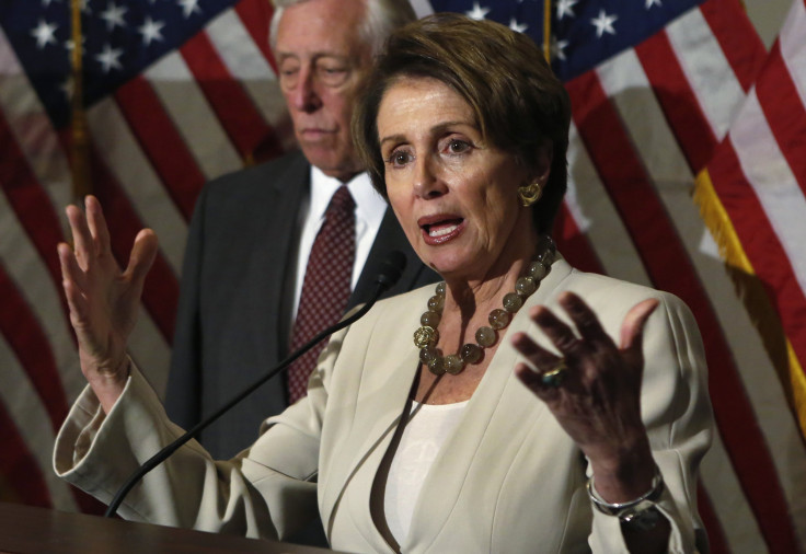 House Minority Leader Nancy Pelosi (D-CA) talks to the media on Obamacare following a Caucus meeting on Capitol Hill in Washington, November 14, 2013.