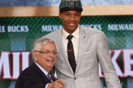Giannis Antetokounmpo (R) from Greece stands with NBA Commissioner David Stern after being selected by the Milwaukee Bucks as the 15th overall pick in the 2013 NBA Draft in Brooklyn, New York, June 27