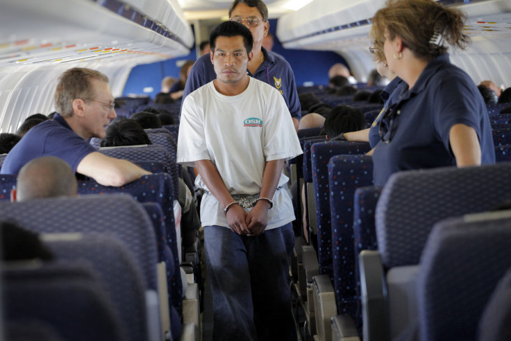 A deportee on a flight to Mexico.