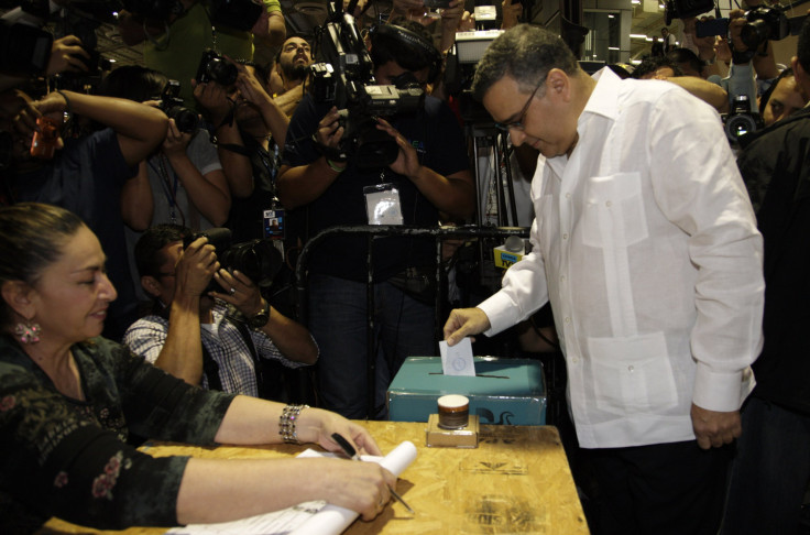 Funes votes in El Salvador.