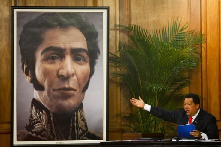 Chávez and a photo of Simón Bolívar