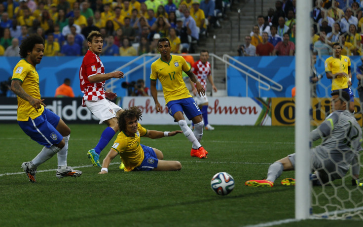 Marcelo scores an own goal.