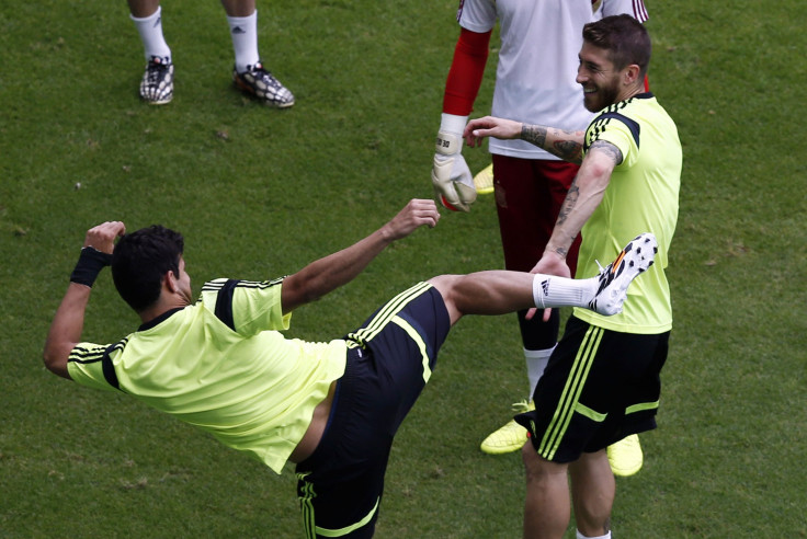 Spanish players mess around during a training session