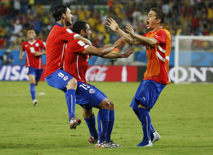 Chile's Jean Beausejour (C) celebrates