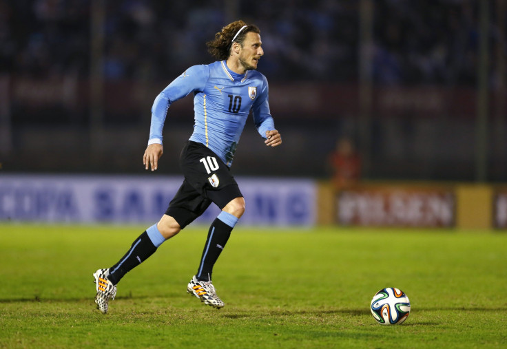 Uruguay's Diego Forlan dribbles