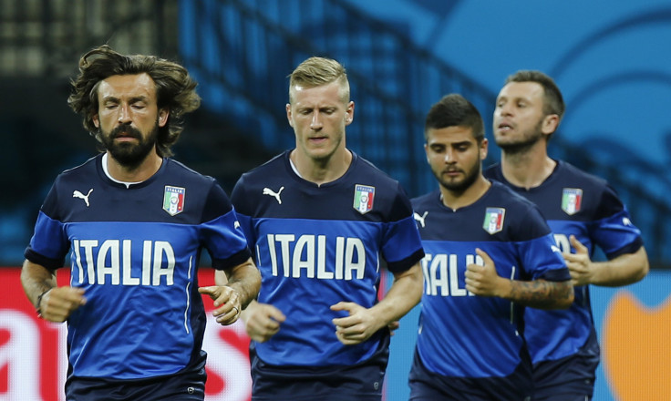 Players from Italy jog during a training session