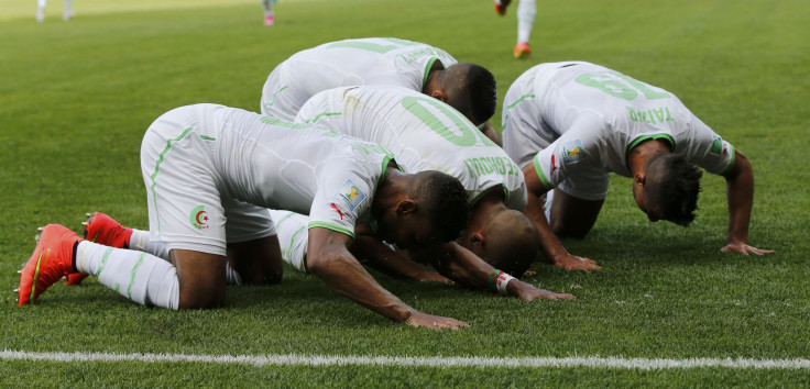 Algeria players kneel