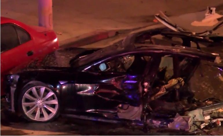 Tesla Model S Splits In Half After Police Chase Crash Driver Survives Massive Wreck Fire Report