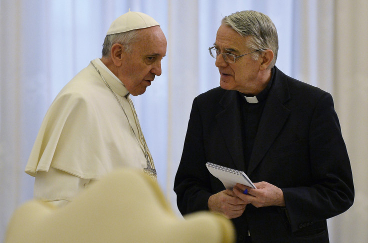 Pope Francis and Vatican spokesman, Father Federico Lombardi.