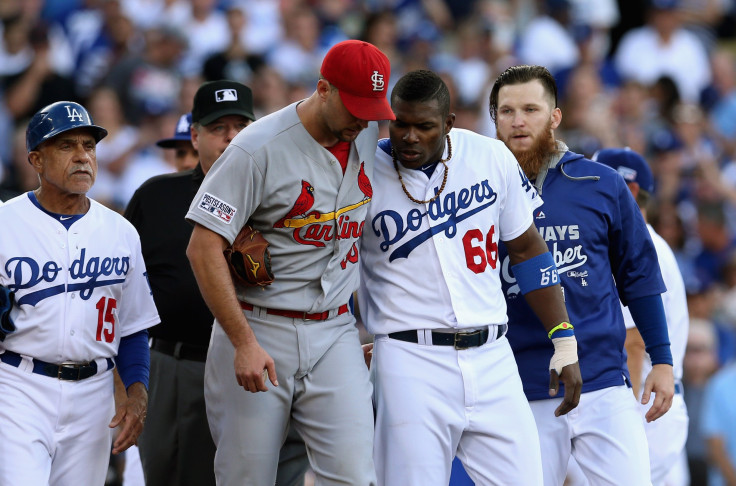 Adam Wainwright and Yasiel Puig