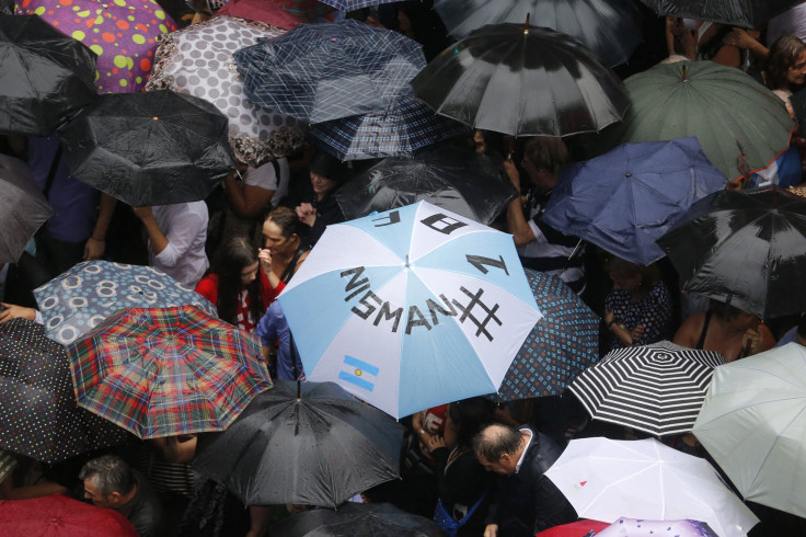 Umbrella-Carrying Protesters Call For Justice in Nisman Case