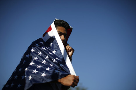 immigrant supporter in a flag