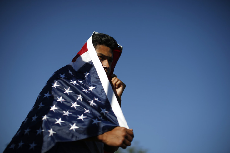 immigrant supporter in a flag