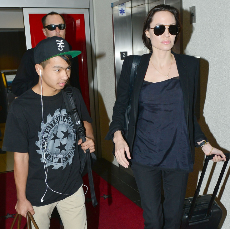 Maddox Jolie-Pitt and Angelina Jolie