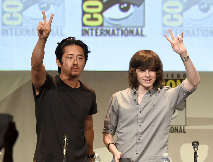 Steven Yeun and Chandler Riggs