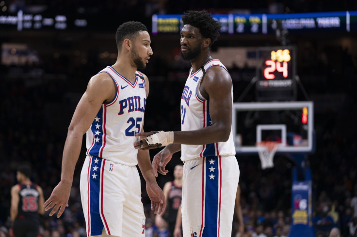 Ben Simmons of the Philadelphia 76ers talks to Joel Embiid 