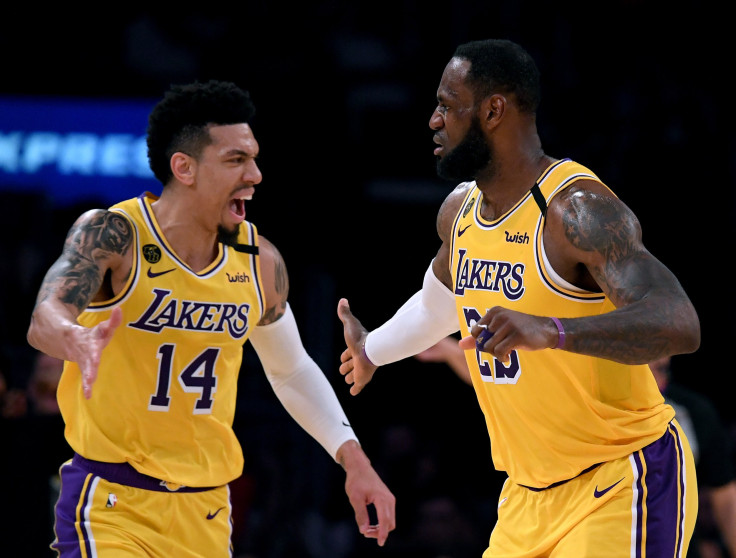 LeBron James #23 of the Los Angeles Lakers celebrates his basket with Danny Green #14
