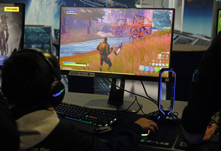 A gamer plays the video game 'Fortnite' developed by Epic Games during the 'Paris Games Week' 