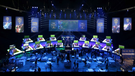 Players compete on Microsoft Xbox and Sony Playstation games consoles in the group stages of the FIFA eWorld Cup Grand Final