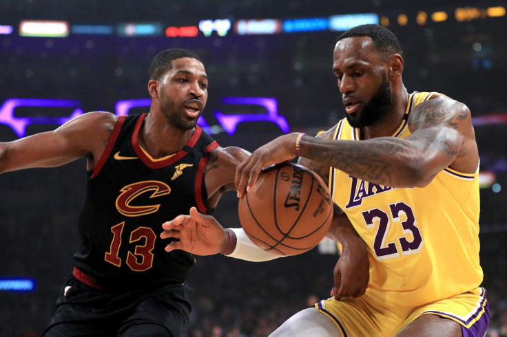 Tristan Thompson #13 of the Cleveland Cavaliers defends against LeBron James #23 of the Los Angeles Lakers