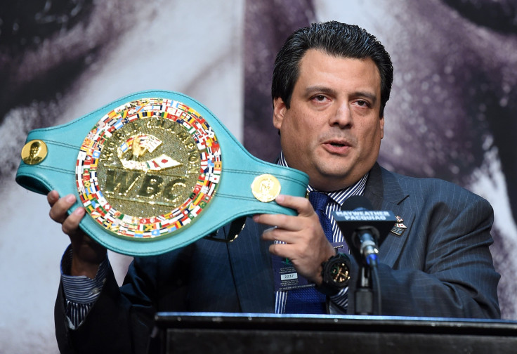 WBC President Mauricio Sulaiman displays a championship belt during a news conference for the unification fight between WBC/WBA welterweight champion Floyd Mayweather Jr. and WBO welterweight champion Manny Pacquiao